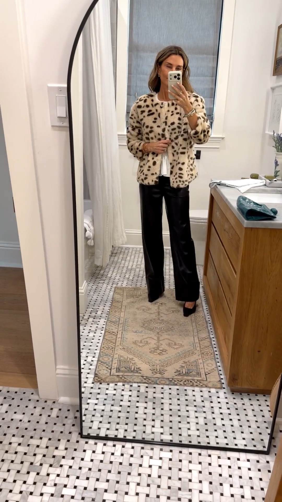 I’m 5’6’’.
-Rue Sophie top size XXS. Beautiful pleated details on this cotton blouse, full zip up the back. Runs TTS (mine is too small)
-Alice + Olivia leather pants are butter soft faux leather pants with cuff. Perfect for events or a night out. TTS
-Target animal print jacket size S
-Quince striped polo size S