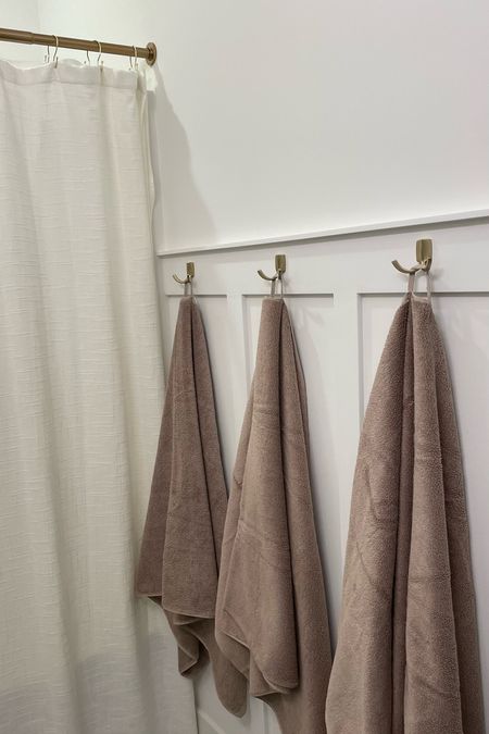 gold accents for our guest bathroom ✨ bathroom towel hooks | gold shower curtain rod | neutral bathroom decor

#LTKhome #LTKstyletip #LTKfamily