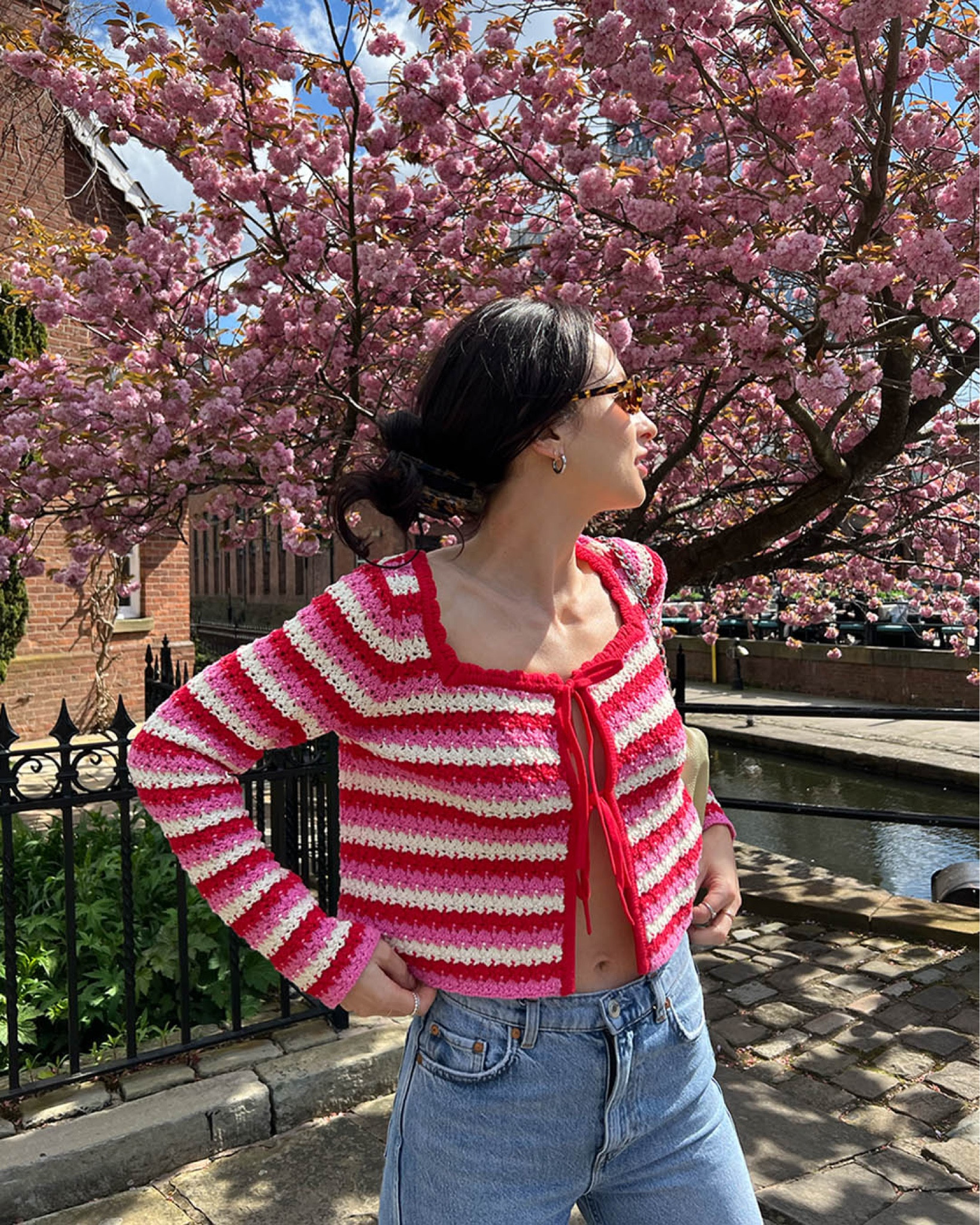 crochet cardigan by kitri 
jeans by & other stories 
sunglasses by velvet canyon 
cowboy boots by all saints 
silver hoops by missoma 
claw clip by arket 

#LTKSeasonal #LTKstyletip #LTKeurope