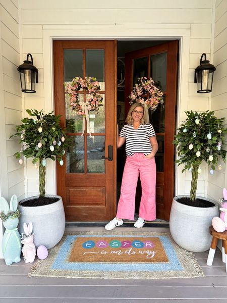 Easter front porch decor and pink wide leg jeans! What else could get you in the spring mood!!?!? 

#LTKhome #LTKfindsunder50 #LTKSeasonal