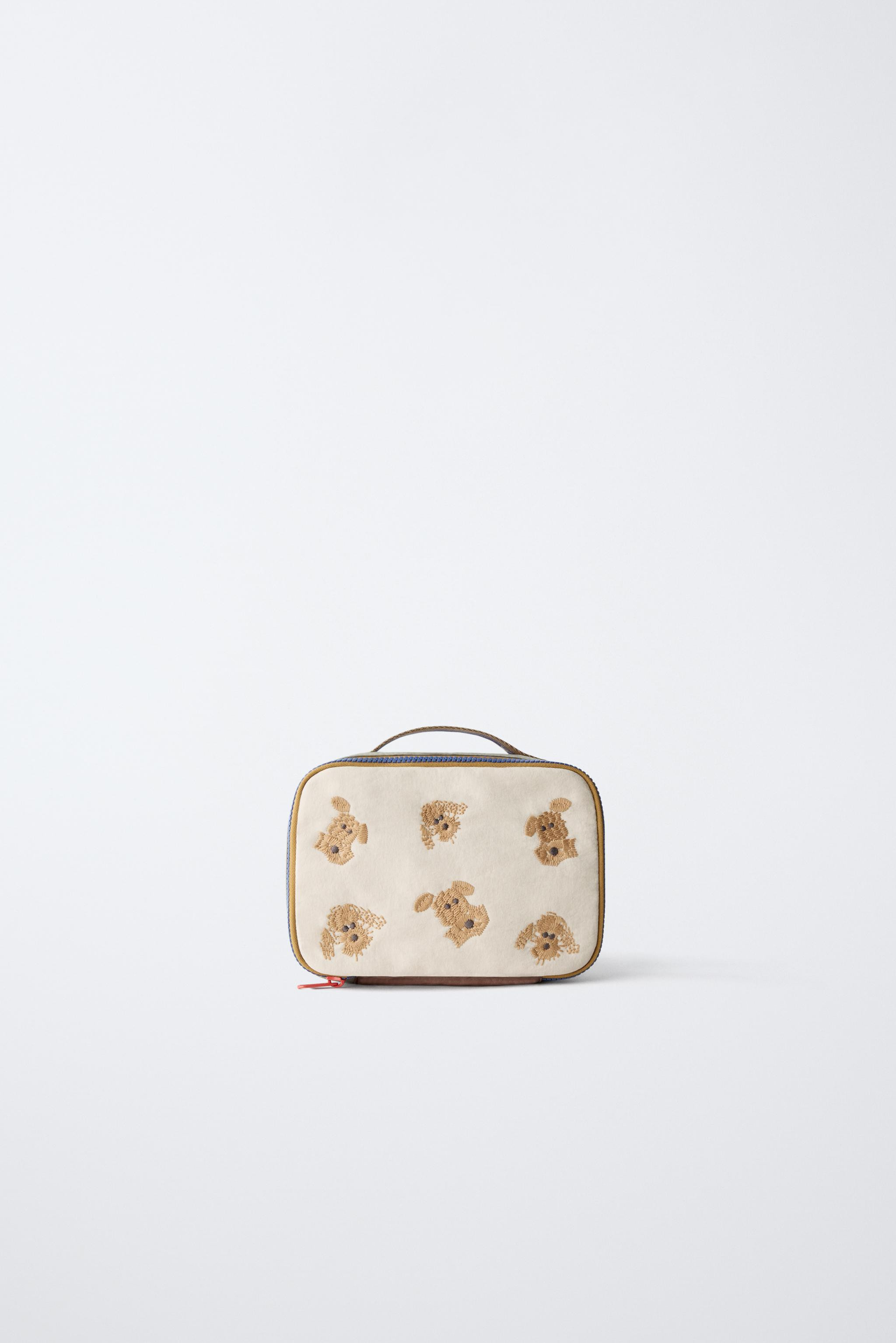 Toiletry bag featuring embroidered puppies. Main compartment with zip closure. Handle.Height x Le... | Zara Canada