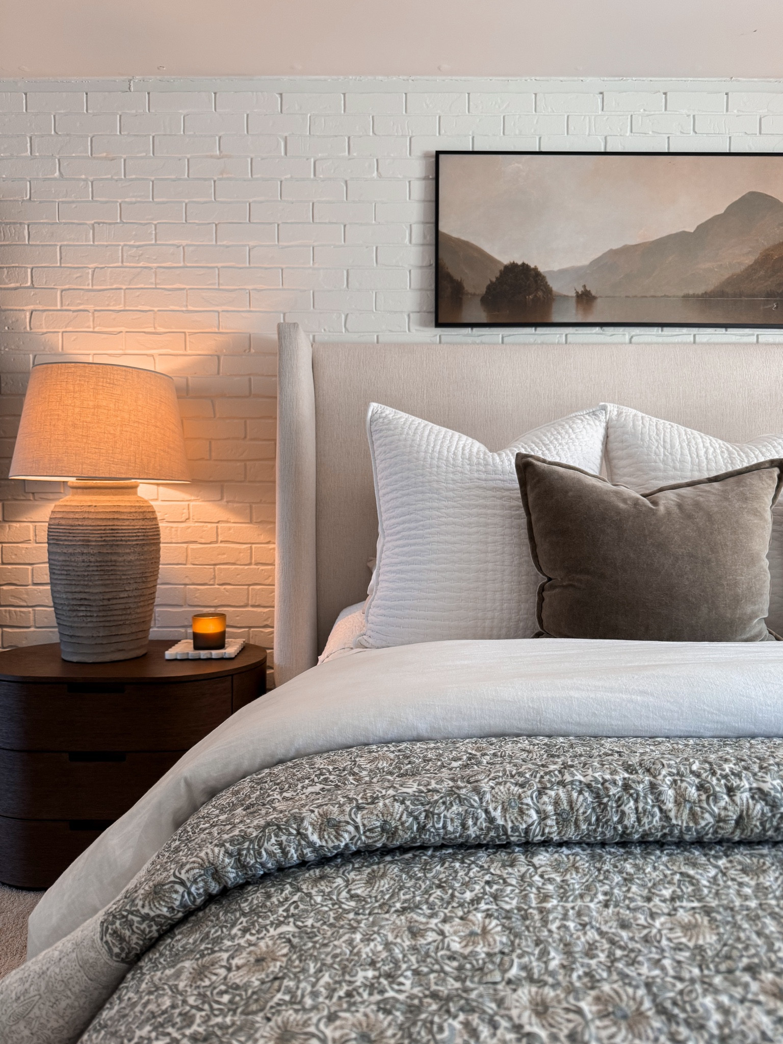 Embracing a traditional Spring bedroom design with a floral quilt, white linens and beautiful green velvet throw pillows. I just can’t quit this artwork so it’s back up on the wall for the season. 

Use my code HIGHVIEWHOME to save 10% on my floral quilt or any other order over $100 at McGee & Co 🤍

The print is linked. I had it framed at Frame it Easy to the size we needed to accommodate the space above our bed. 

Our exact nightstands are from RH but I linked a few additional Options I’m loving below. 

#LTKSeasonal #LTKHome #LTKStyleTip