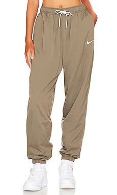 Nike Essential High Rise Jogger in Sanddrift from Revolve.com | Revolve Clothing (Global)