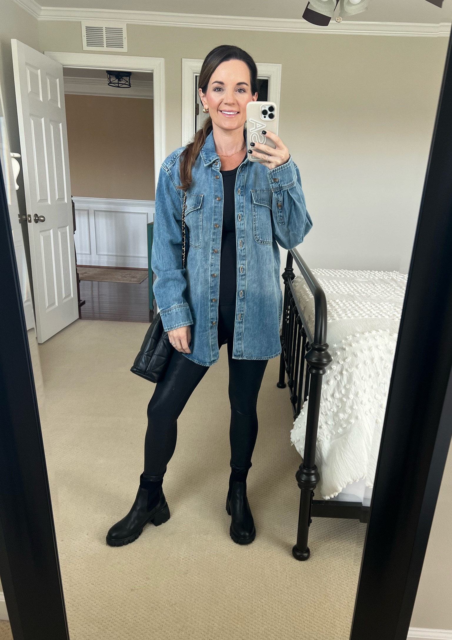 Today OOTD / my fall uniform 
Target Oversized denim chambray shirt 
Amazon Black tank top 
Faux leather leggings 
Chelsea boots fits tts 
$25 Quilted bag (comes in other colors) 

#LTKStyleTip #LTKFindsUnder50