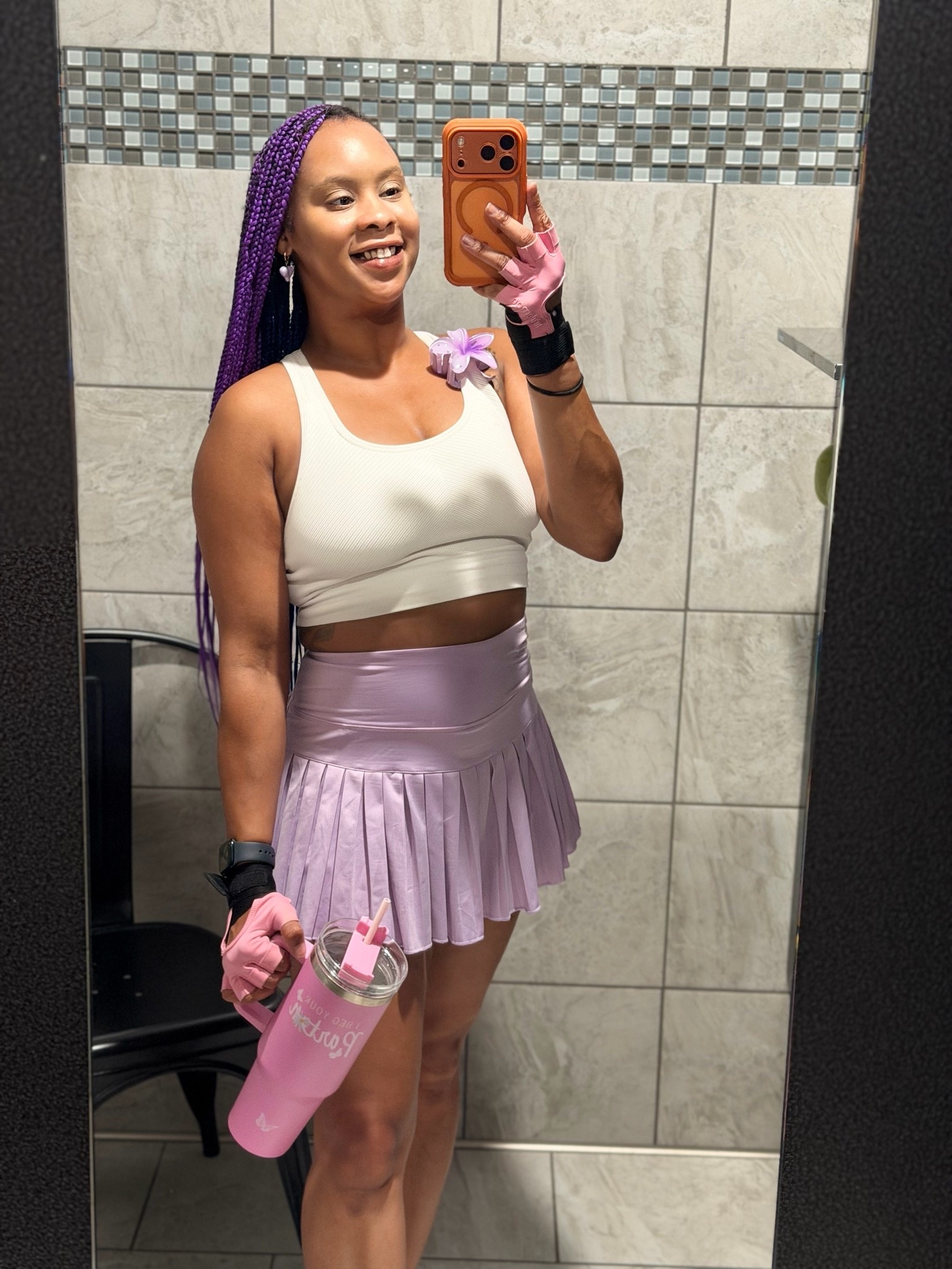 Just me and my Dolly Parton Cup 💕 White sports bra, ribbed crop top, lavender athletic skirt, pleated workout skirt, pink gym gloves, lifting gloves, pink tumbler, water bottle, phone case, hair accessories, floral hair clip.

#LTKActive #LTKmorningroutine #LTKfitnessgoals