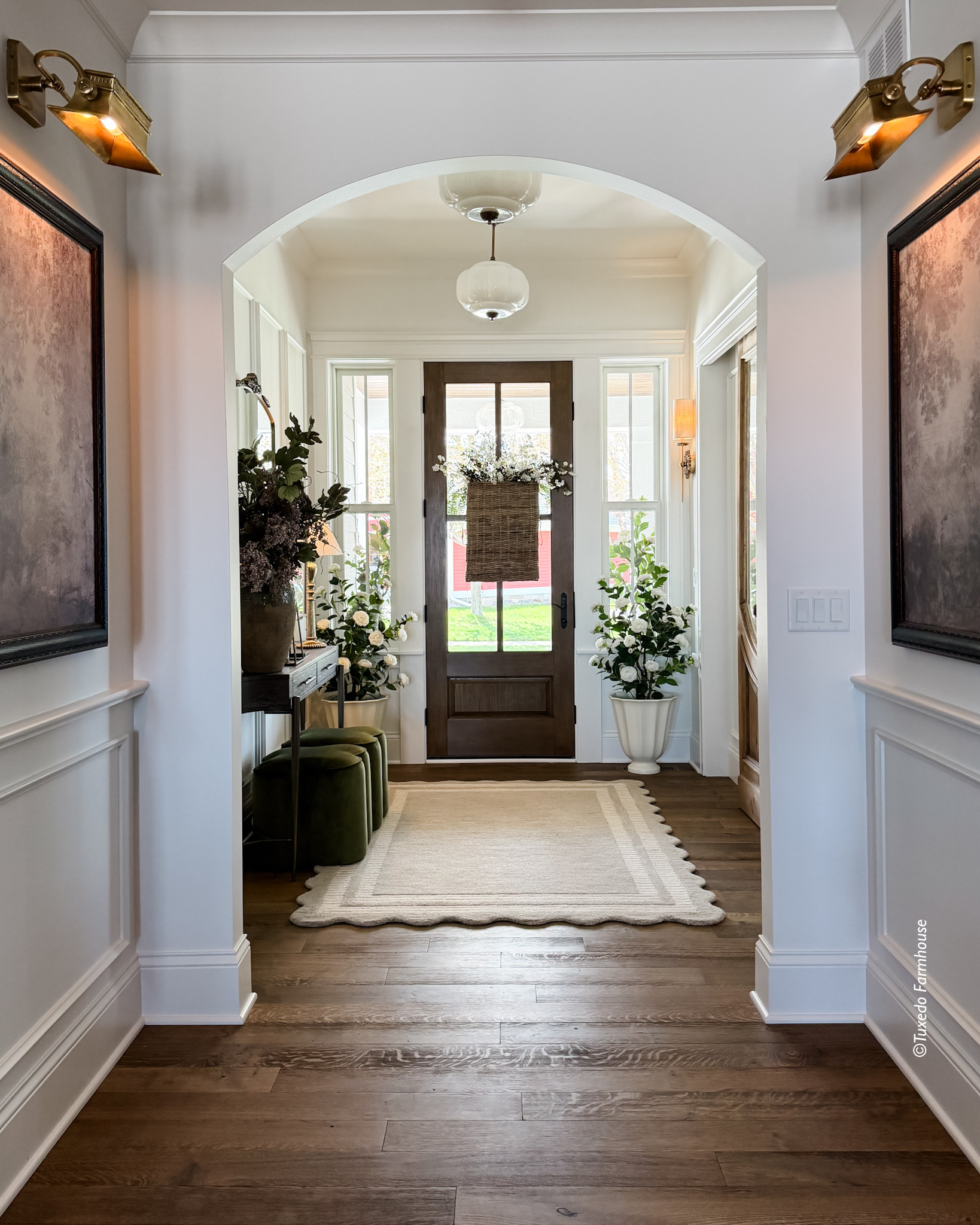 If it fits in your budget, add the details. It’s what makes a home yours. My foyer is my favorite area of my home. I had a vision for this space very early in the build process. I wanted it to be spacious, welcoming, light and bright and to set the tone for my home. Details that I added here: wall moulding, vintage doors to my office, an archway to break to the hallway area, windows vs sidelights and unique lighting.

Wall moulding is from @luxe_architectural_moulding, and is easy to install. Vintage doors are from @antiquitieswarehouse. Floors are custom, character grade white oak. Dingman Custom Homes brought my vision to light.

#LTKSeasonal #LTKHome #LTKdayinmylife