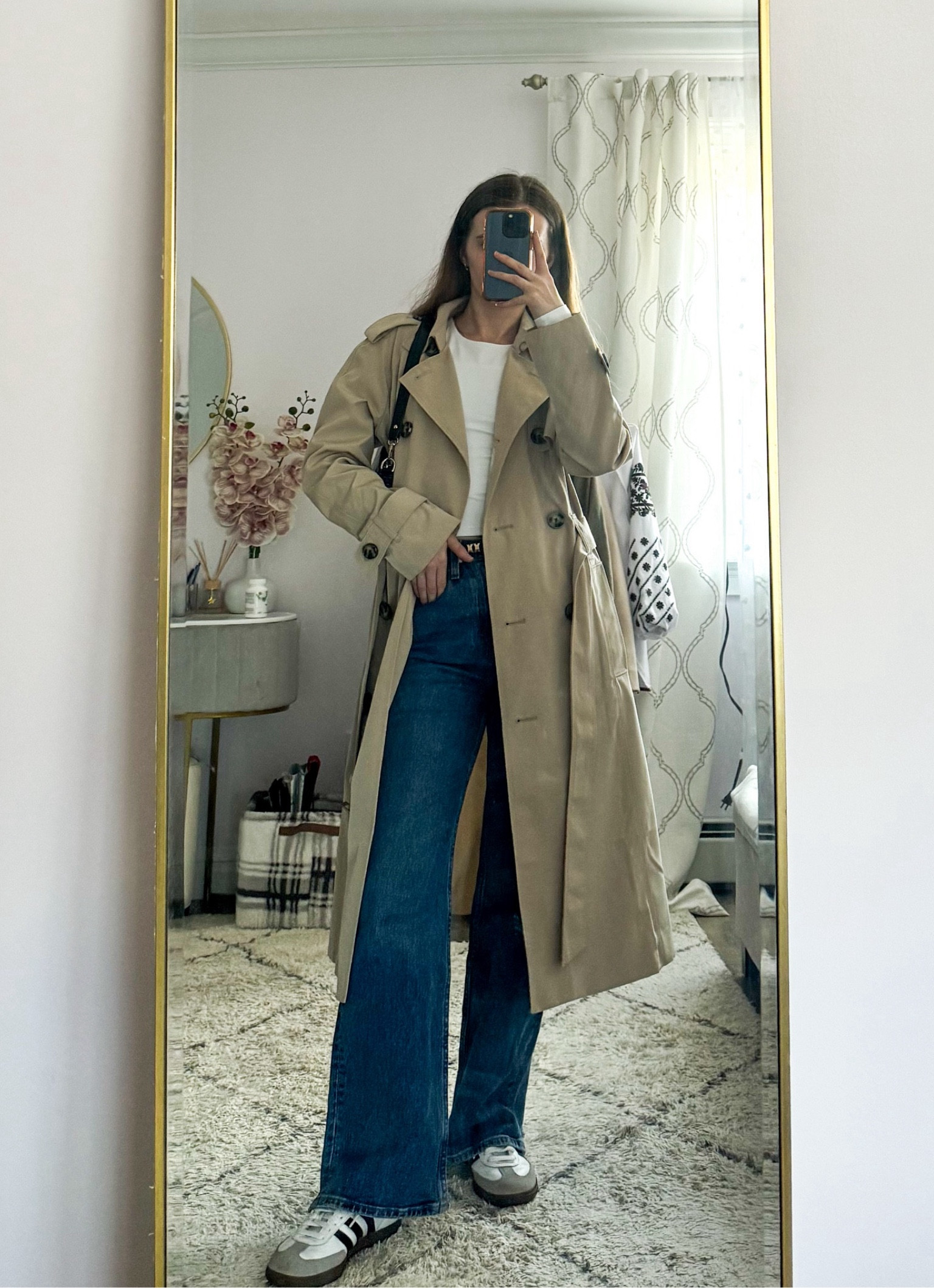 A classic trench coat paired with straight leg jeans, a white top, Adidas Sambas, a chic shoulder bag, and a belt is perfect for everyday wear, travel, or an elevated casual winter outfit.
.
.
.
.
.
Trench coat outfits | trench coat beige | beige coat | belted coat | long coat | rain coat | winter work outfits | streetwear | street style | jeans outfits | jeans and sneakers | white tops | basic tops | adidas sambas outfit | spring outfit 

#LTKSeasonal #LTKU #LTKSaleAlert #LTKGiftGuide #LTKWorkwear #LTKTravel #LTKShoeCrush #LTKItBag #LTKPetite


#LTKFindsUnder50 #LTKFindsUnder100 #LTKStyleTip
