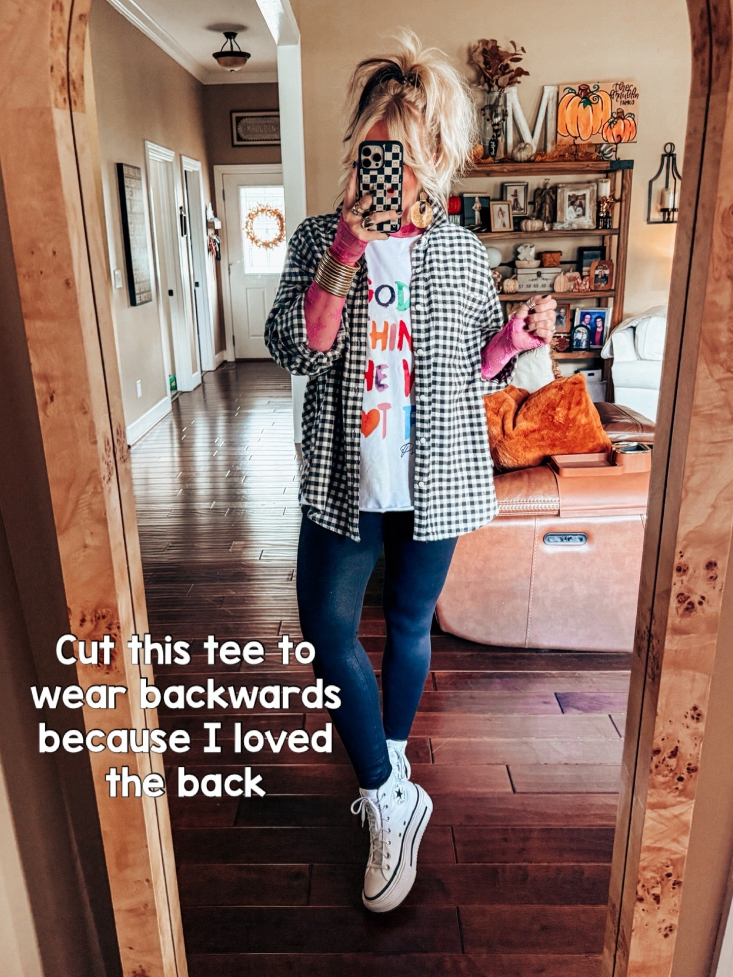 This graphic tee I cut to wear backwards. I’m in a size L and my mesh top is a medium. My leggings are also a size medium  

#LTKFindsUnder50 #LTKStyleTip #LTKOver40