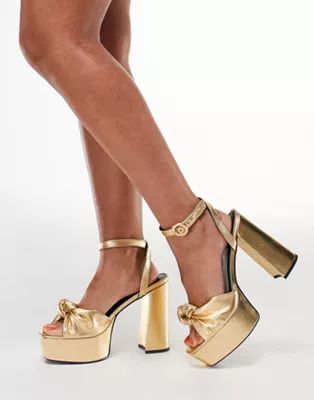 ASOS DESIGN Note knotted platform heeled sandals in gold | ASOS (Global)
