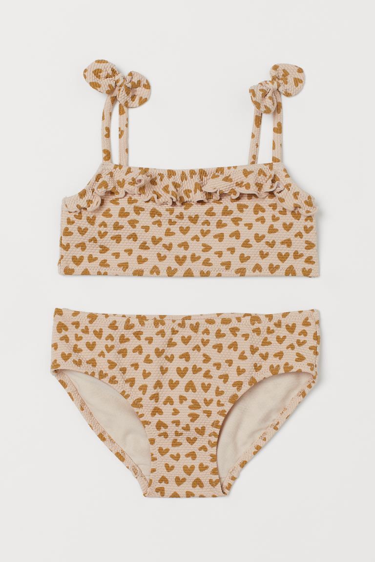 KIDS EXCLUSIVE. Fully lined, textured bikini. Top with flounced trim at upper edge and narrow sho... | H&M (US + CA)