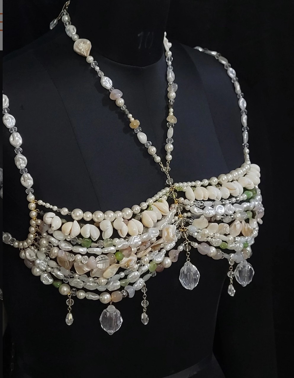 Dive into your inner sea goddess with this handmade crystal shell beaded bralette 🐚✨ Featuring iridescent pearls, colorful gemstones, and delicate beading, this showstopping top blends mermaidcore magic with burlesque glam. Designed as a body chain meets bralette, it’s the perfect festival outfit, carnival look, or statement piece for a fantasy-inspired photoshoot. One-of-a-kind and made with care—this Etsy favorite is a wearable work of art.

#LTKSummerEdit