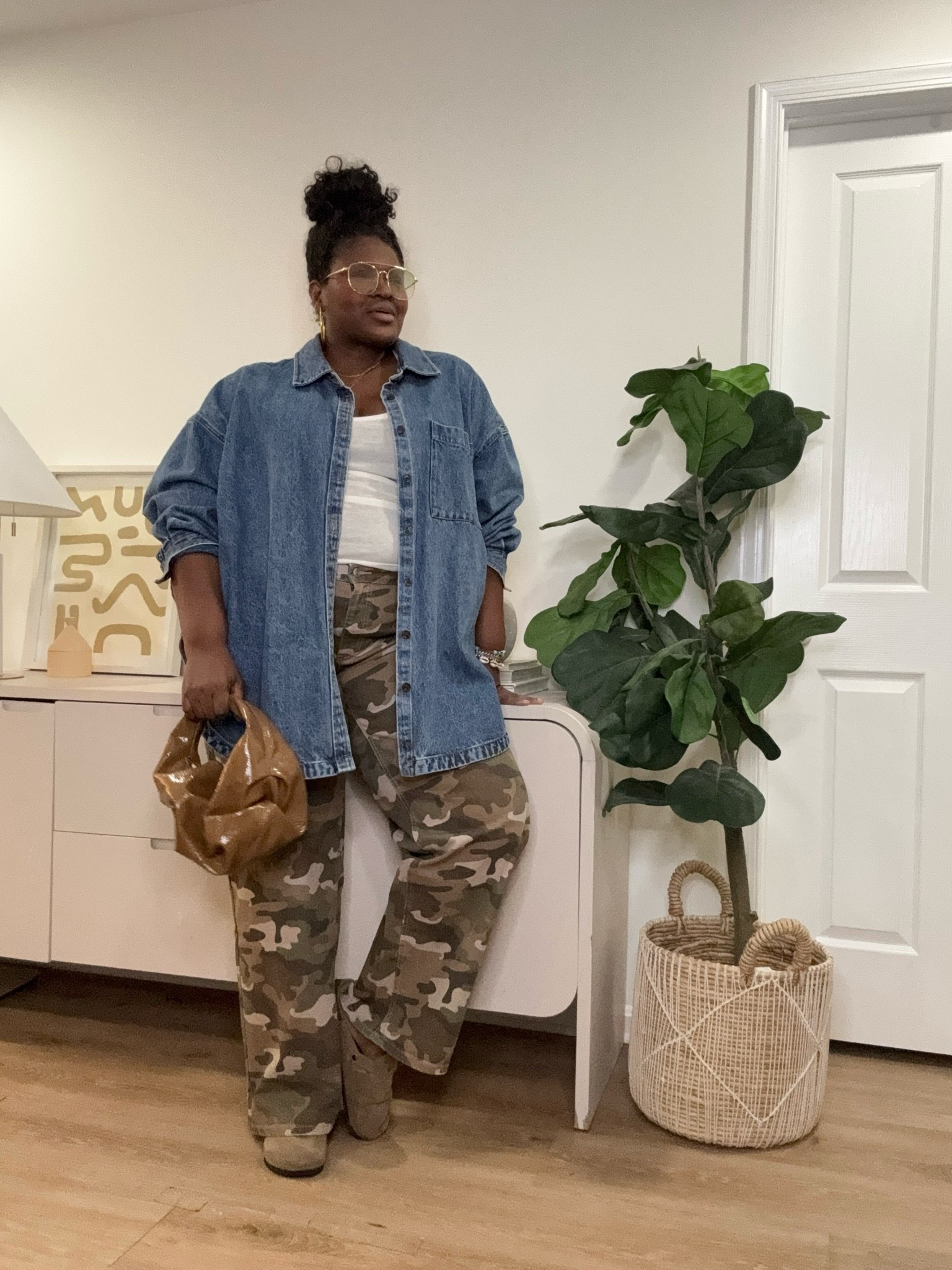 This casual outfit combines everyday wardrobe staples that are easy to mix and match. The camo pants add a stylish statement while the denim shirt creates a classic layered look perfect for casual days, travel, and weekend outfits.   camo pants outfit, denim shirt outfit, casual fall outfit, everyday outfit ideas, plus size fashion, curvy outfit ideas, oversized denim shirt, street style outfit, casual chic style, fall wardrobe essentials, comfortable outfit, weekend outfit ideas, layered outfit, neutral accessories, LTK fashion

#LTKootd #LTKSeasonal #LTKMidsize