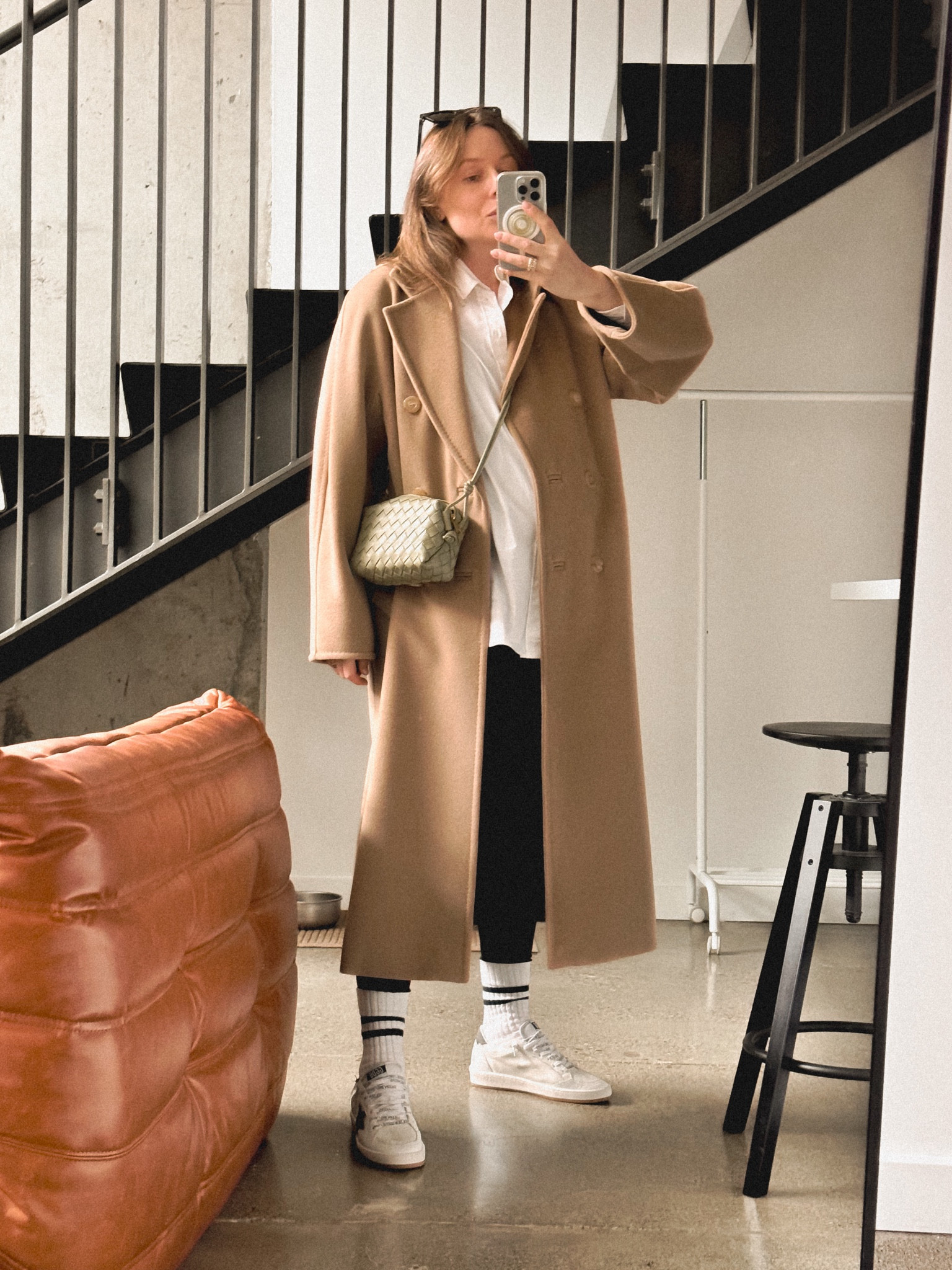 Honestly if I had to pick and keep one thing for the whole pregnancy 🤰 I would pick H&M mama before and after maternity leggings- they have been such a life saver especially during the third trimester! 
Wearing my favorite leggings with Lacoste ribbed retro style socks, Golden goose 🪿 Ball Star Sneakers with leopard stars (have you seen leopard sneakers by H&M for $35?) Polo Ralph Lauren button down shirt (more affordable option available at Everlane), Max Mara Madame coat (check out similar and more affordable style - Aritzia The Slouch coat in camel rewool), Bottega Veneta mini loop camera bag. 

#LTKFindsUnder50 #LTKBump #LTKSeasonal