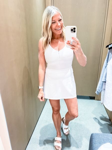 Love this white tennis dress with white Birkenstocks. Size small dress. Go up in size if you are larger in the chest. I should have tried on the medium (my bra size). Alo yoga 

#LTKSeasonal #LTKActive #LTKfitness