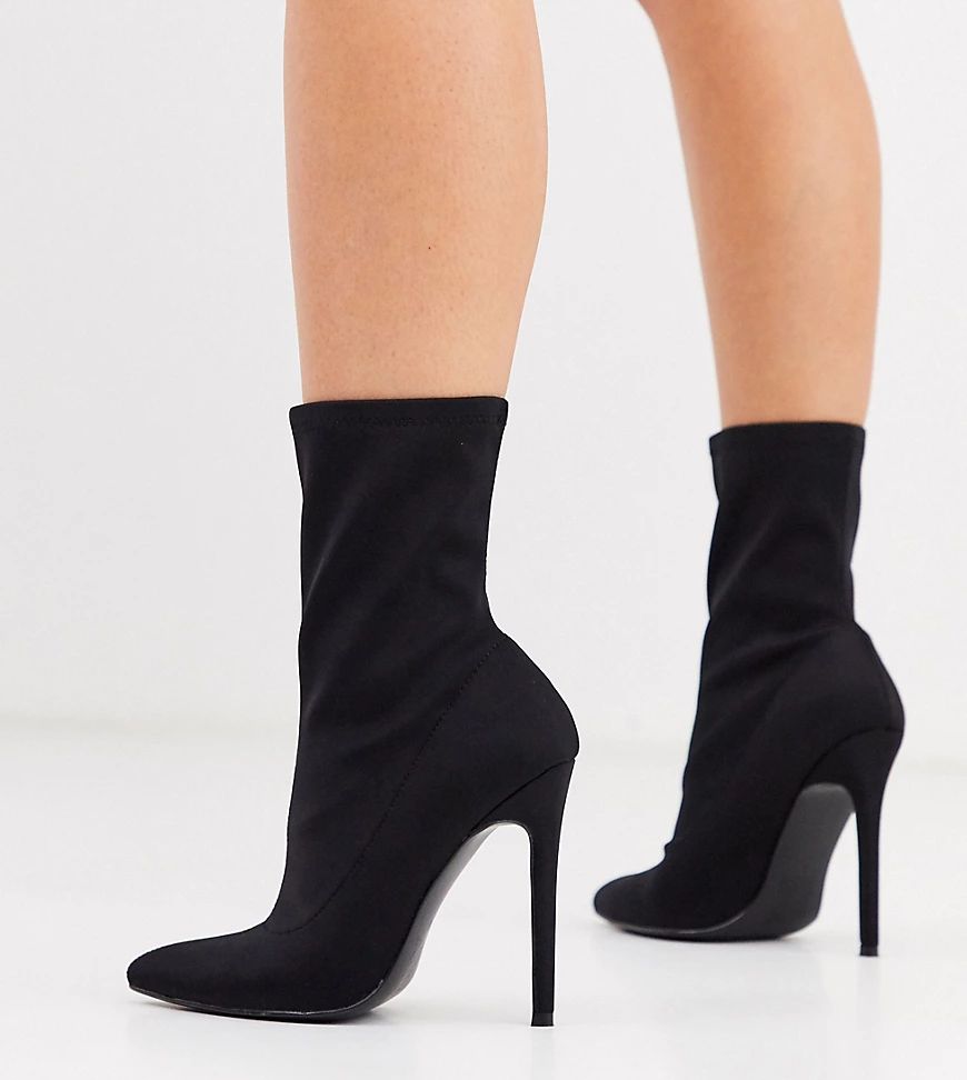 ASOS DESIGN Wide Fit Esmerelda high heeled sock boots in black | ASOS (Global)