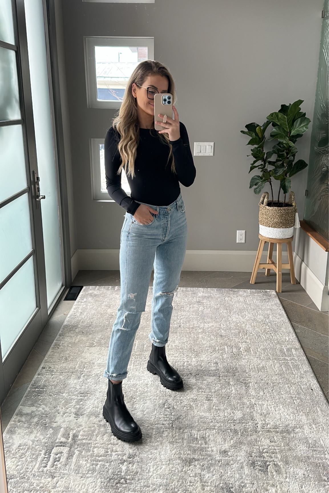 Size 27 in jeans + small in the bodysuit! 