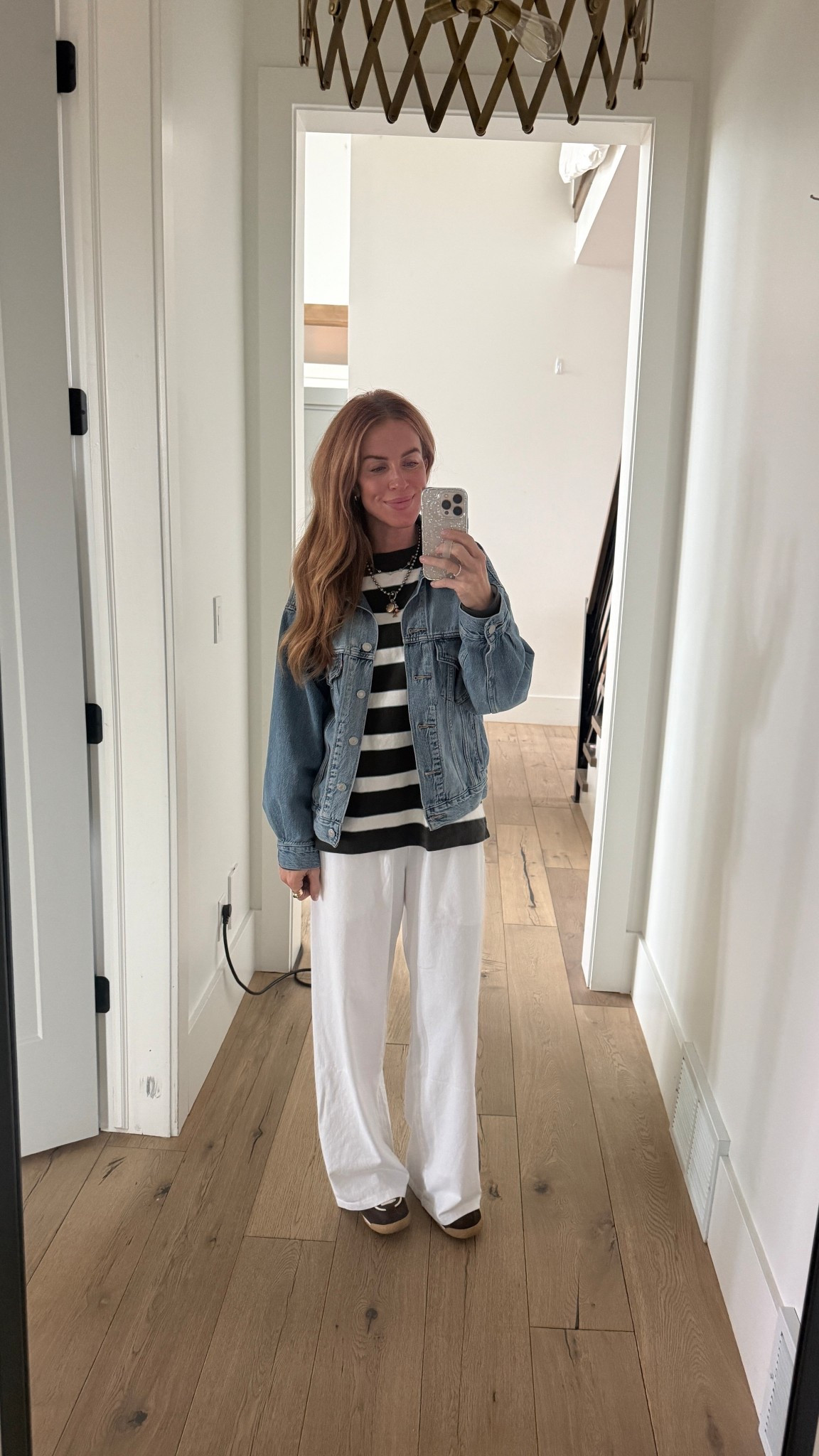 Top is from AYR, comes in lots of colors.. I’m loving the oversized fit + strip details. I’m in the small.

Jacket is from Levi’s! If you see me in a jean jacket, it’s this one. I size down in it.. wearing the XS.

It’s been quite warm here in Utah despite it being January.. I was able to wear these lightweight linen pants! I’m in the small, but they run a bit big – could have sized down.

Shoes are Dolce Vita, comfy sneakers. They fit TTS.