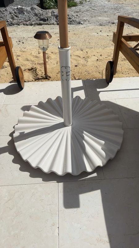 Business and Pleasure clamshell umbrella base perfect for pool side. 

#LTKfamily #LTKSeasonal #LTKhome