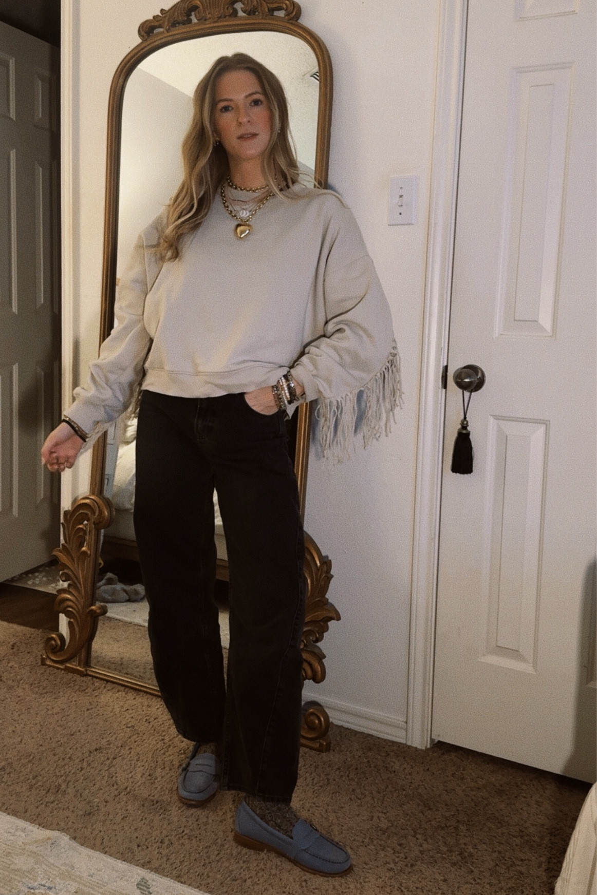 The most fun sweatshirt! The fringe is so good. And my favorite way to dress up my basics is to add a killer jewelry stack! 

#LTKStyleTip #LTKFindsUnder100