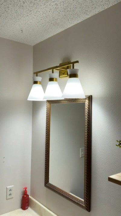 Bathroom Vanity Light Upgrade

One light fixture made a bigger difference than I expected. ✨ I swapped out our builder-grade vanity light for this brushed gold fixture, and it instantly warmed up the space. I even tackled the installation myself with a little guidance from my husband! The bathroom makeover isn’t finished yet, but this was a huge first step. I linked the light if you’re planning an easy bathroom refresh.

#LTKHome #LTKSeasonal #LTKSaleAlert
