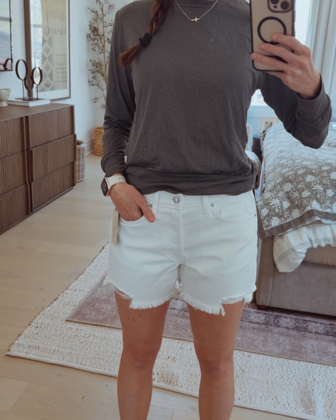 $28 cutoff white Target shorts- with the perfect inseam for us Millenials 🤍 So comfy and flattering! These are TTS, I’m wearing a 4, but the 2 fits as well! I’m 5’6” and 130 👏🏻
