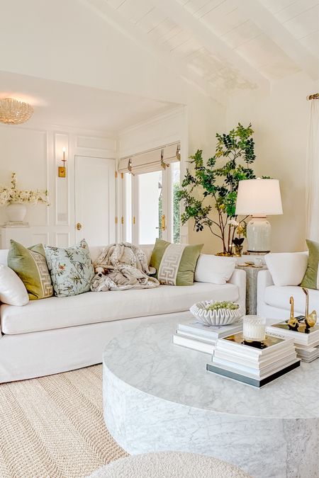 Living Room details 🌿

My 2 sofas are from RH - 
Belgian Slope Arm Slipcovered in fabric, Perennials textured linen weave, white 

55” marble Coffee Table - RH in Carrera marble 

Lamp - Rooms & Gardens, a shop in Montecito, Ca  