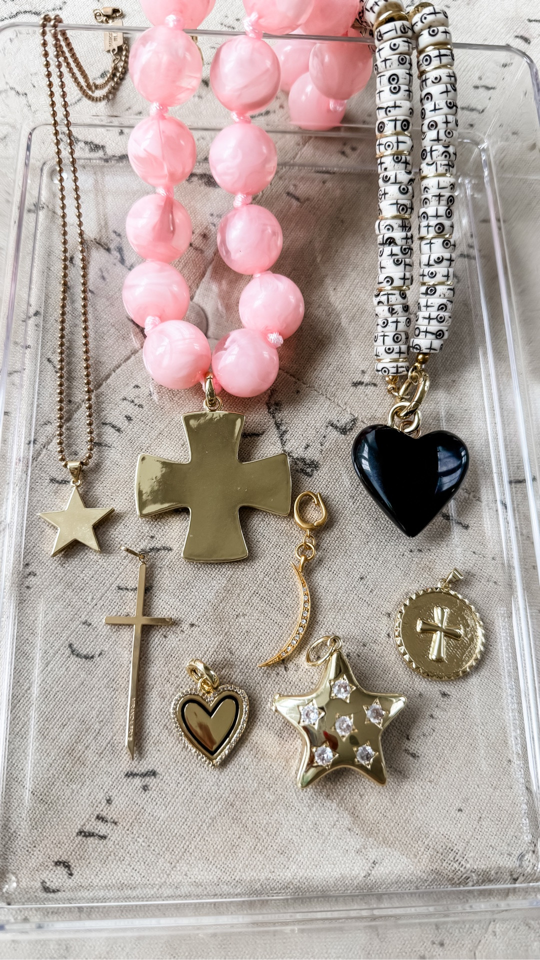 Code CHARM for 40% off charms. Heart charm, cross, necklace, star charm.

#LTKSaleAlert