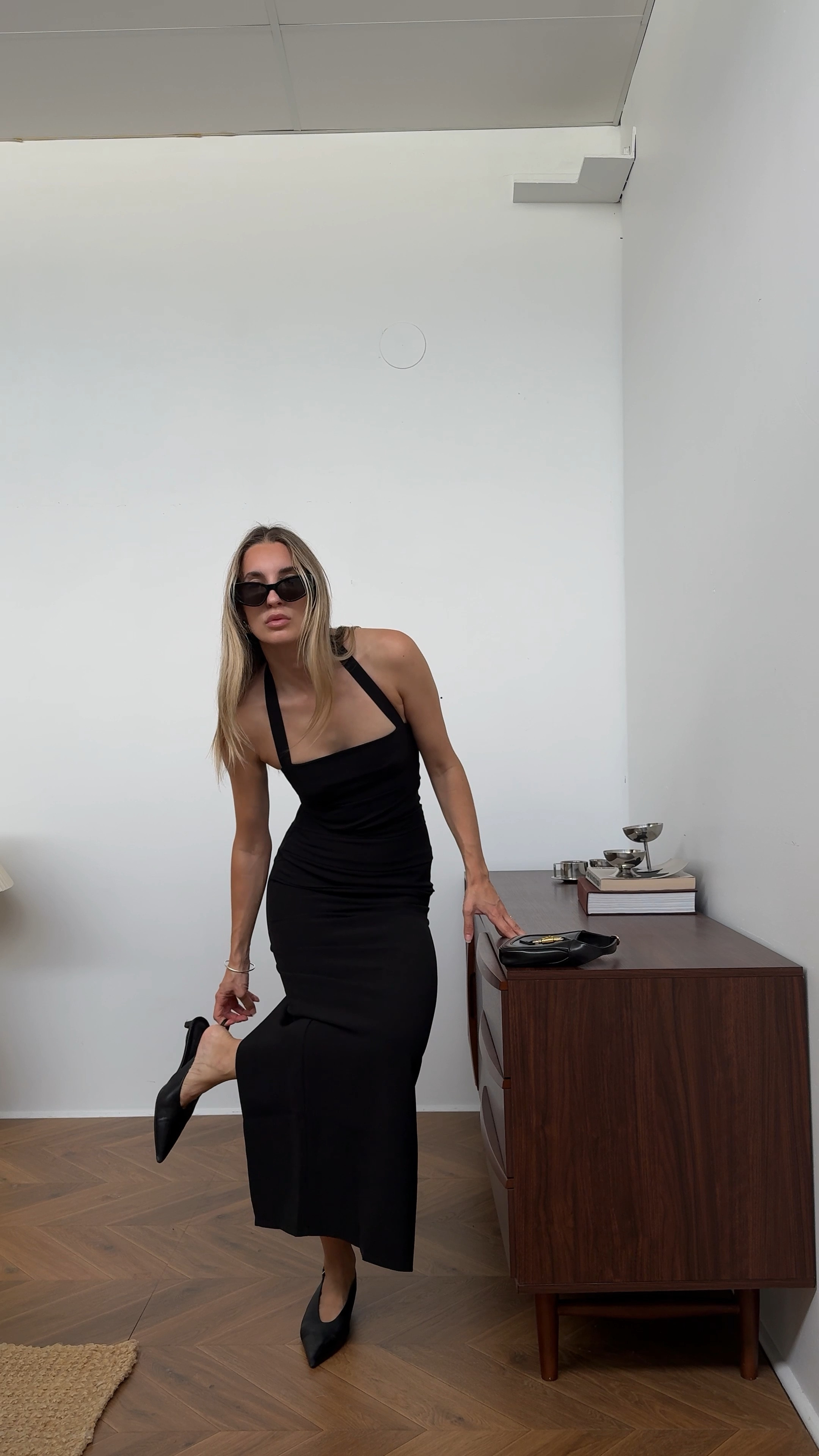 Day 7 of styling summer outfits from my own wardrobe - you can never go wrong with a black maxi dress. The perfect outfit for attending a black tie wedding, date night or wines with your besties! Wearing a size 6/XS in this #lioness dress.

#stylingvideo #summeroutfits #summeroutfitideas #ltk #grwmreel #grwmoutfit #bermudashorts #toteme

#LTKwedding #LTKaustralia #LTKsummer