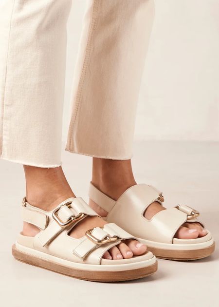 Not going to lie these stopped me in my tracks, love these white neutral sandals for spring!  They come in multiple colors and will be great all through summer too.
Plus, I moisture onto things with gold hardware. 

Spring sandals | capsule wardrobe | spring outfits | spring style | spring shoes |  white sandals | festival outfits

#SpringOutfits #SpringShoes #SpringSandals #CapsuleWardrobe #NeutralFlats 

#LTKFind #LTKSeasonal #LTKshoecrush