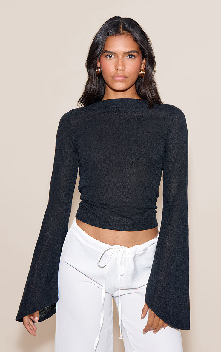 Black Textured Extreme Flute Sleeve Long Top | PrettyLittleThing US