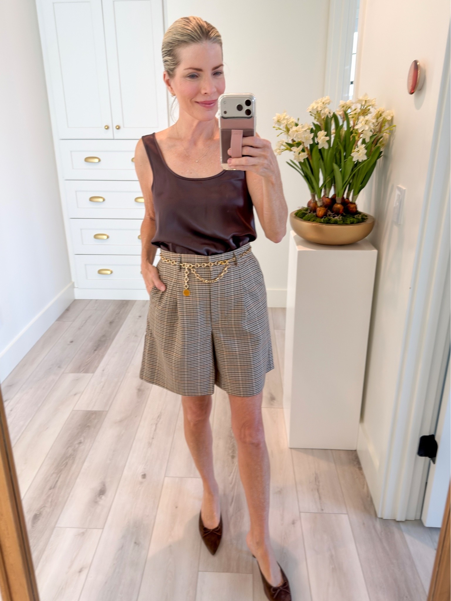 Love these long trouser shorts for fall. Wearing a size 4 and an XS in the tank. ￼
My gold chain belt is several years old. I linked similar belts.