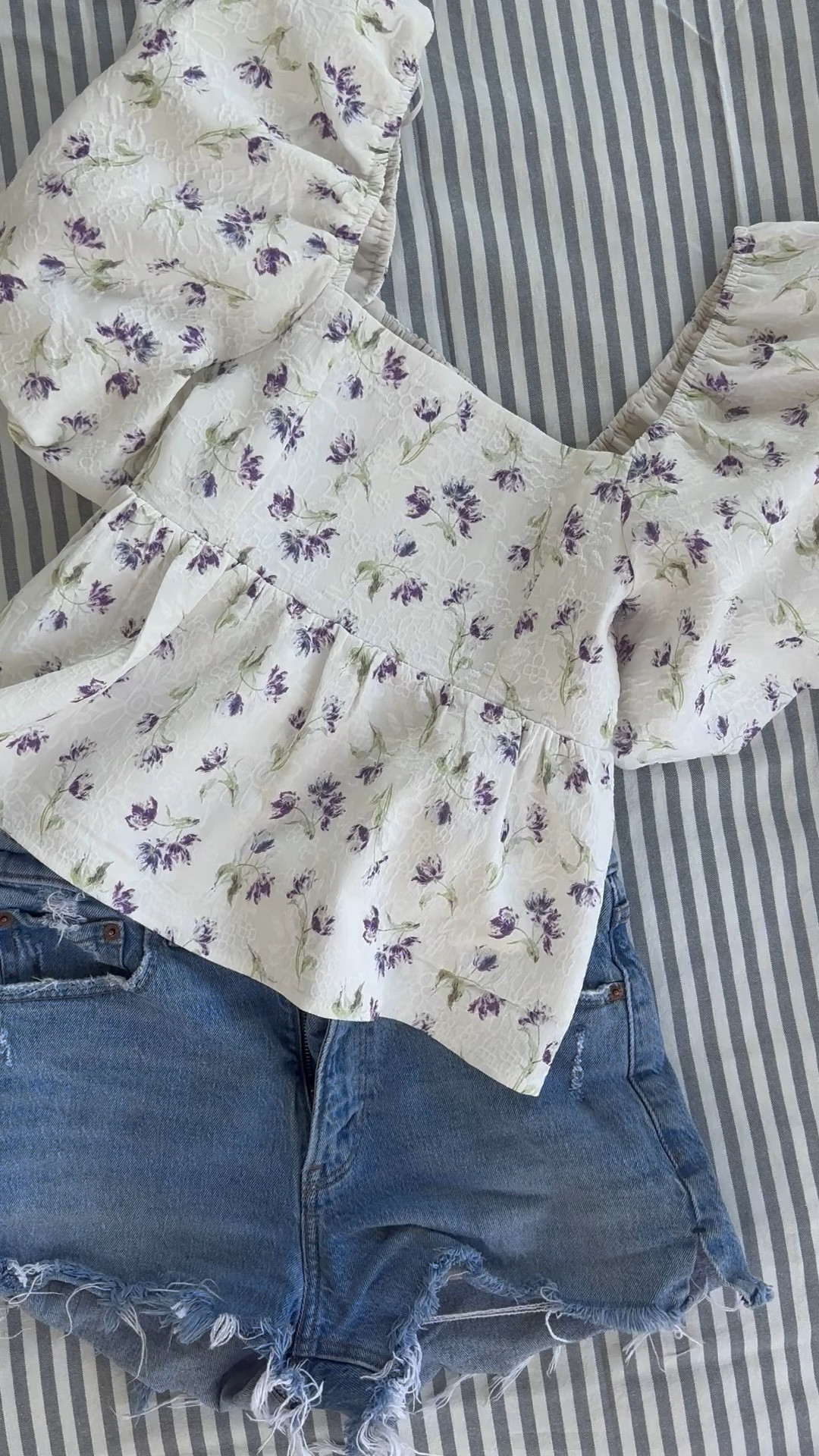 The perfect top for spring paired with my favorite cut off shorts - they run tts wearing size 26. Easter outfit, Easter top, puff sleeve top, cut off shorts, vacation outfit, spring outfit floral top resort top, Tuckernuck. Callie Glass

#LTKstyletip #LTKFind #LTKSeasonal