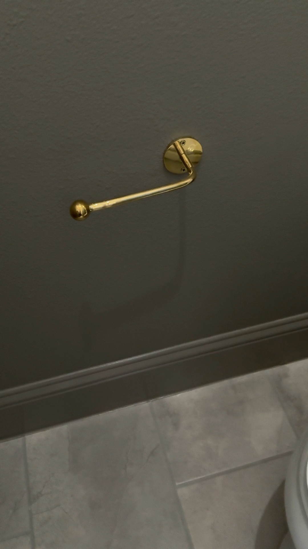 Simple brass toilet paper holder for the powder room makeover ✨ 



#LTKHome