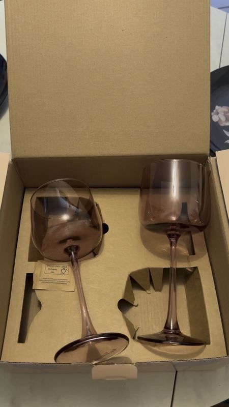 Gift idea for mother in law, sister, aunt, friend, neighbor, or new home owner! Everyone needs at least one nice pair of wine glasses. Colored glass is such a fun trend right now too. 

#LTKGiftGuide #LTKSeasonal #LTKHoliday