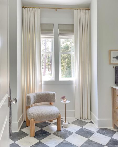 Our master/primary bathroom has a beautiful view to the lake outside!  We added curtains and a small Sitting area with this incredible petite shearling chair and marble side table!  It’s perfect!!

#LTKfindsunder50 #LTKhome