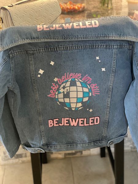 Make your own Taylor Swift Concert Outfit! I purchased this denim jacket off of Amazon and paired it with an iron on from Etsy! I purchased the iron on and wrote “bejeweled” in the comments to get this exact iron on. It took me 20 minutes and saved me over $100. Get your perfect custom jacket for the Taylor Swift Eras Tour. 

Swiftie, Concert, Stadium Bag, Taylor Swift Concert, Lavender Haze, Concert outfit, Taylor Swift Concert Outfit, Lover Concert, Taylor Swift Eras, Taylor’s Version, Bejeweled, Eras Tour 

#LTKFestival #LTKunder50 #LTKFind