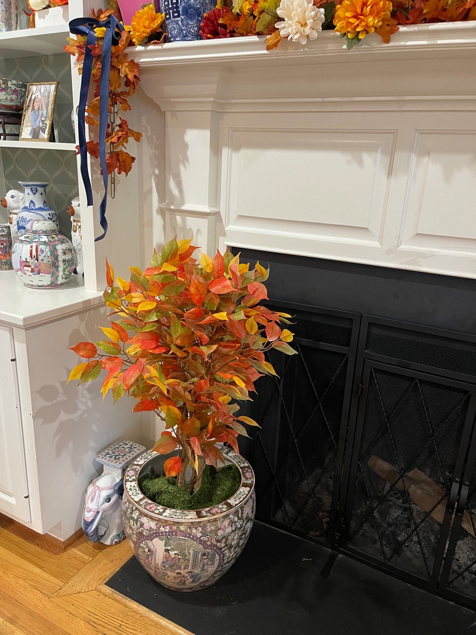 Adding seasonal touches to the fireplace instantly makes the whole room feel cozy and festive 🍂✨. I styled my hearth with this Nearly Natural autumn ficus tree in a chinoiserie planter for the perfect pop of fall color 🌻🍁. Paired with gold candle holders, velvet ribbon, and classic blue & white ginger jars, it blends traditional décor with warm seasonal charm. This setup is ideal for transitioning your living room into a cozy autumn retreat while keeping a timeless, elegant look 🕯️🍂.

⸻

fall mantel décor, cozy autumn home styling, artificial fall tree, chinoiserie fireplace styling, Amazon fall home finds, seasonal living room décor, gold candle holders, velvet ribbon decorating, blue and white ginger jar, timeless fall fireplace ideas


#LTKFindsUnder50 #LTKFindsUnder100 #LTKHome