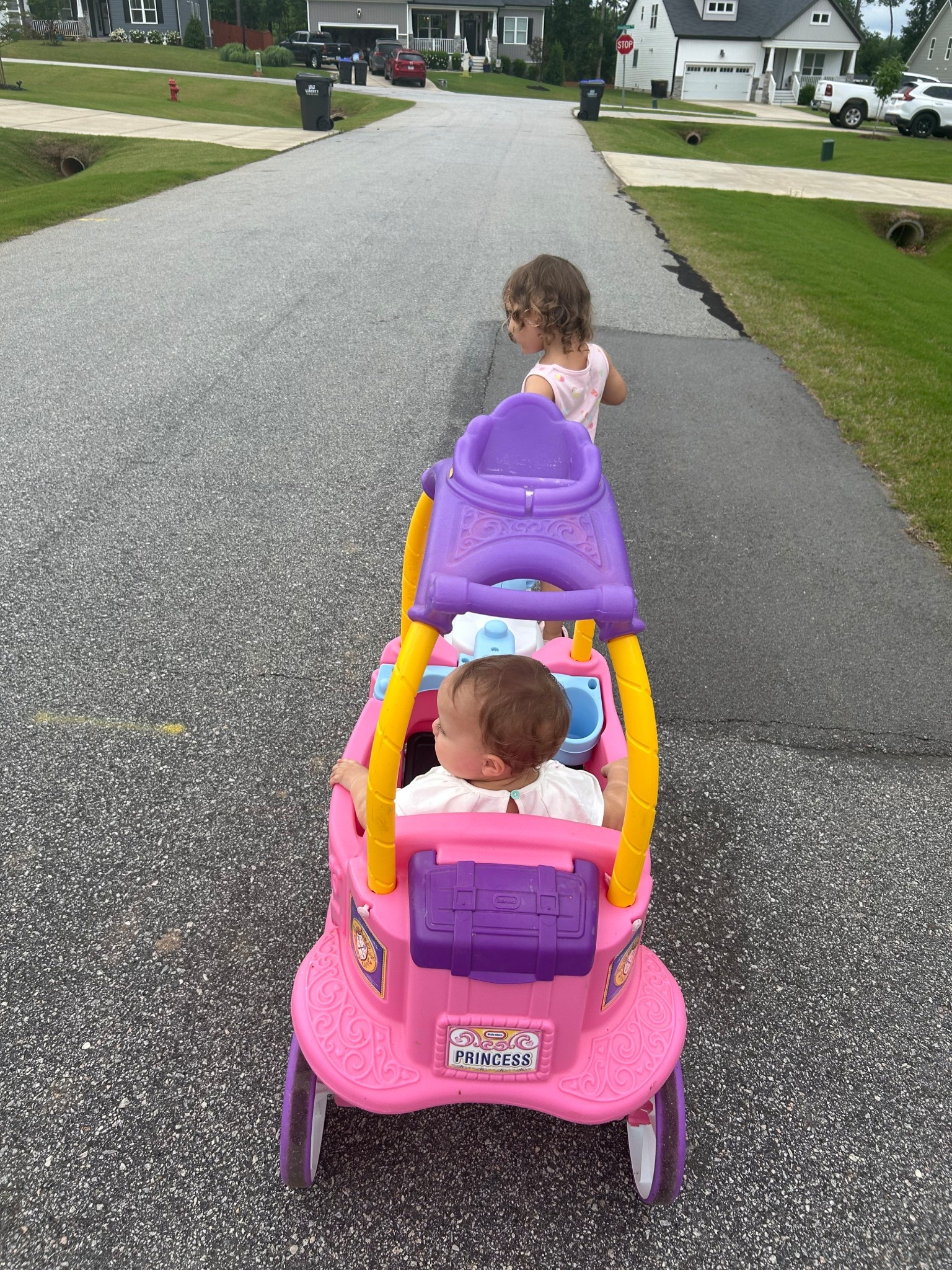 Girl mom life! The two girls are playing outside with their princess carriage. Seems like we might need to buy a second one soon!! Toddler toys, outside toys, girl birthday present ideas

This one is out of stock and a couple years old but I found some fun pink toy cars! 

#LTKSummerEdit #LTKKids #LTKFamily