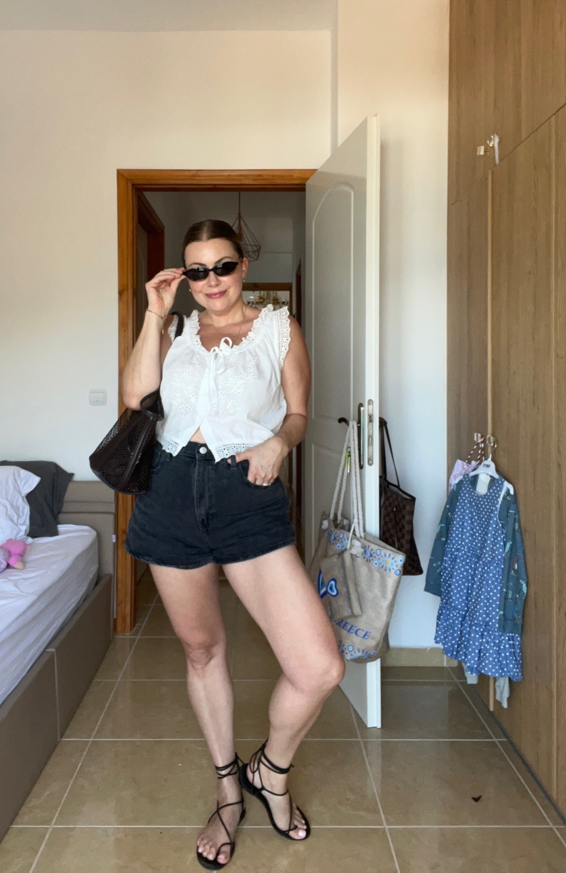 Vacation outfit
Mom outfit 
Levi’s mom shorts
Lace summer top 
Lace up sandals

#LTKmomlife #LTKOver40 #LTKMidsize