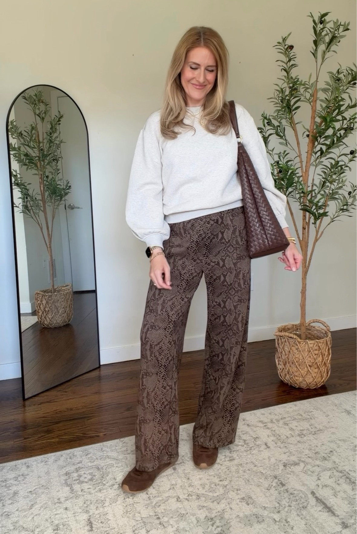 Walmart scubaknit pants in snakeskin print! True to size small. Great for travel. Sized up to medium in this sweatshirt. #walmartfashion