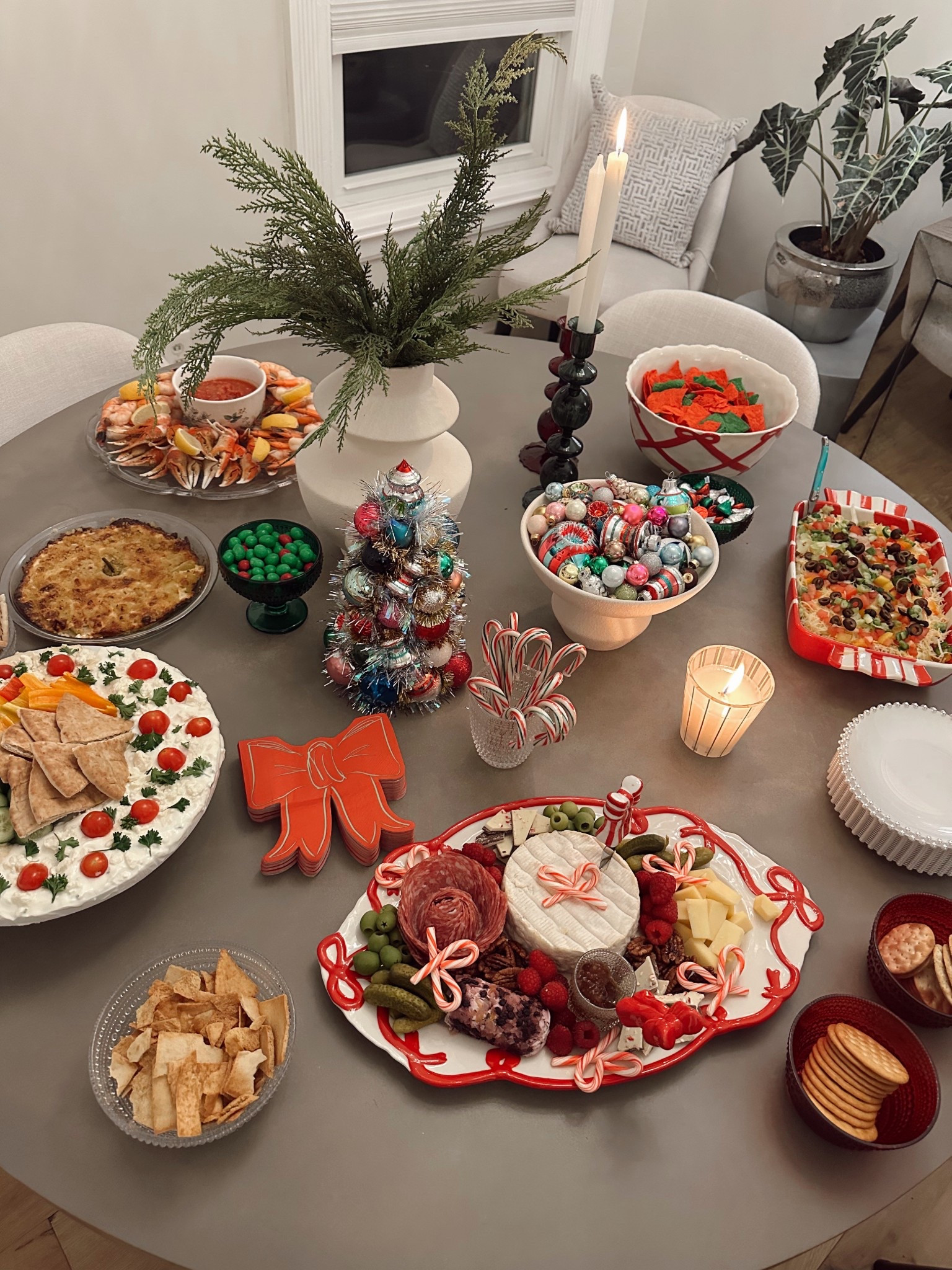 Holiday Hosting Made Merry 🎀✨
Serving up festive bites on my favorite holiday pieces from the Anthropologie Benedita Bow collection — the red-and-white ribbon detail is everything! It instantly dresses up your spread and makes even store-bought snacks feel elevated. 💁‍♀️

From the charcuterie board to the layered dips, every dish found its place thanks to these cheerful, candy-cane-worthy serving pieces.
🎄Holiday must-haves I used:
• Red bow platter for charcuterie
• Candy cane cocktail picks
• Mini ornament tree centerpiece
• Festive ramekins, candles & footed bowls
• Holiday-themed cocktail napkins & serveware

Everything linked to help you host in style this season — just add snacks and friends! 🍷🎁

#HolidayTablescape #ChristmasPartyIdeas #AnthropologieHome #BeneditaBowCollection #ChristmasCharcuterie #FestiveEntertaining Home #LTKSeasonalStyle #LTKEntertaining #ChristmasHostess #BowTrend #AnthroStyle Finds


#LTKFindsUnder100 #LTKHoliday #LTKHome