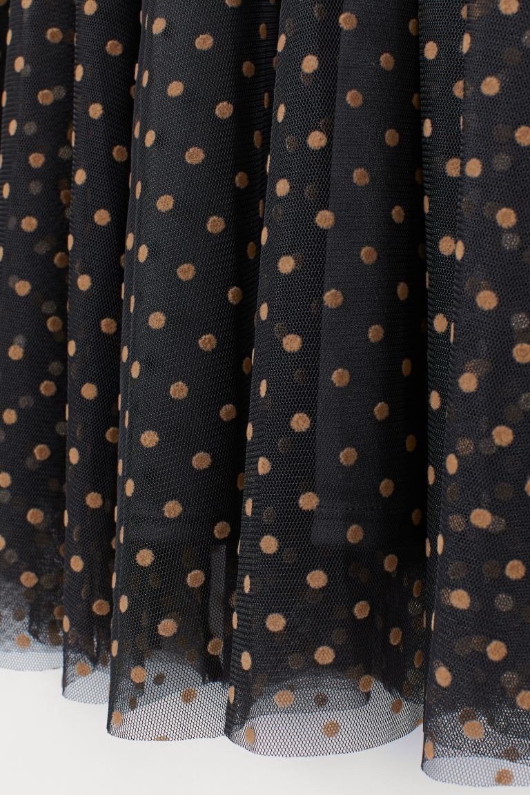 Wadenlanger, ausgestellter Tüllrock mit Flockdruckmuster. Modell mit hohem, elastischem Bund. Ge... | H&M (DE, AT, CH, NL, FI)