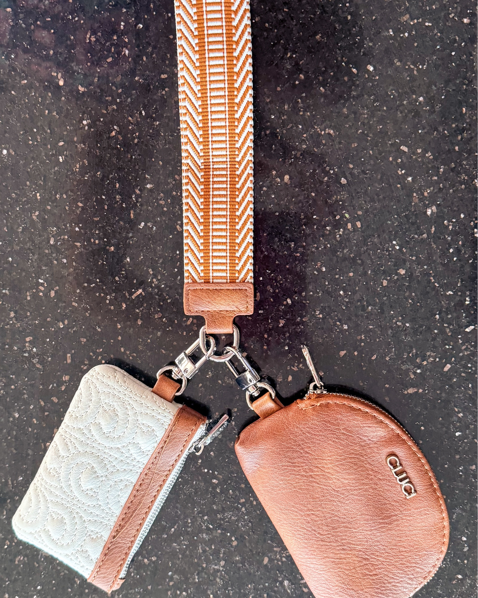 This dual pouch wrist wallet is adorable, functional, and the quality is fantastic! Perfect for carrying cards, cash, lip gloss, etc. 