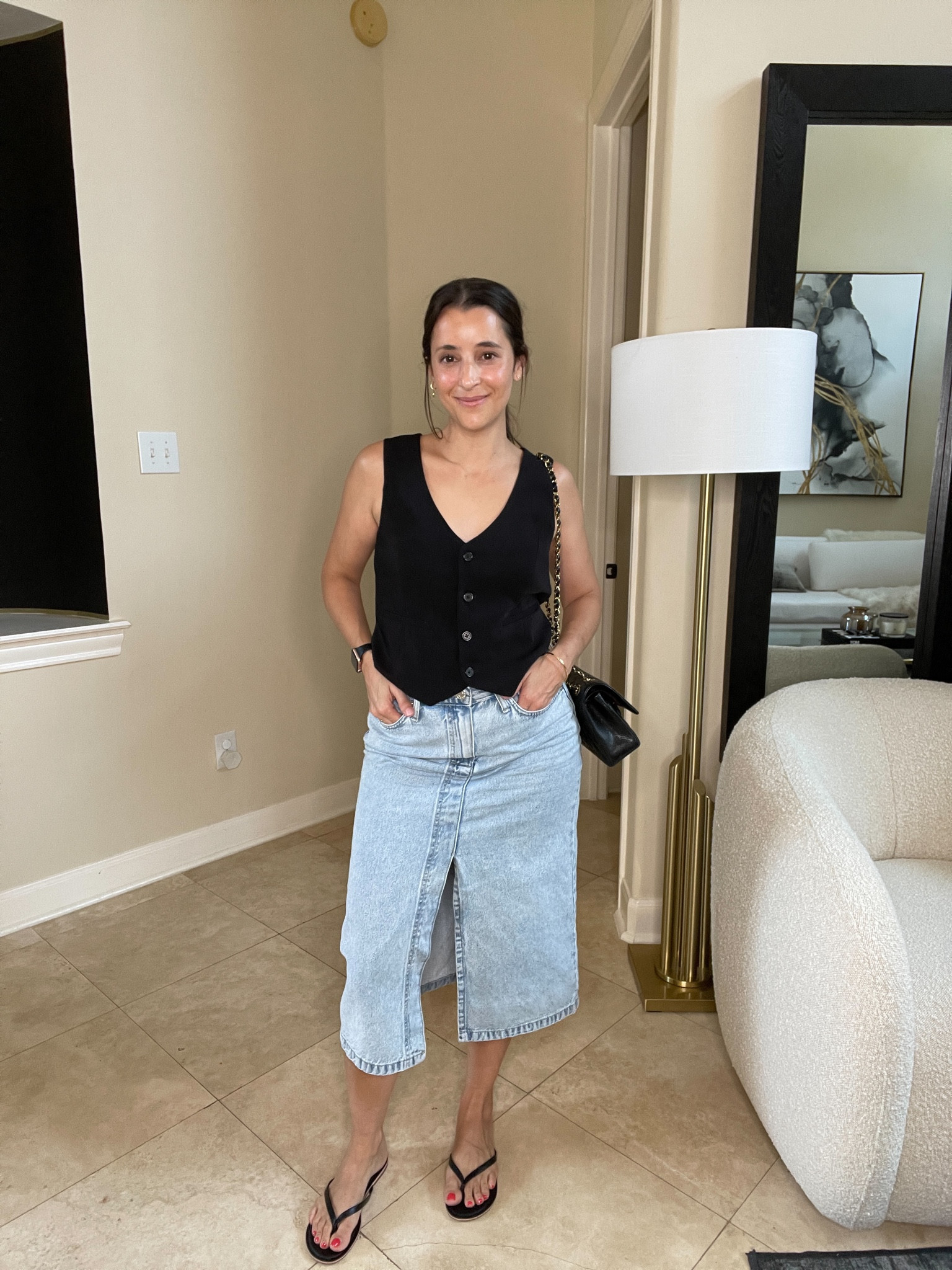 Midi denim skirt, black waistcoat, 