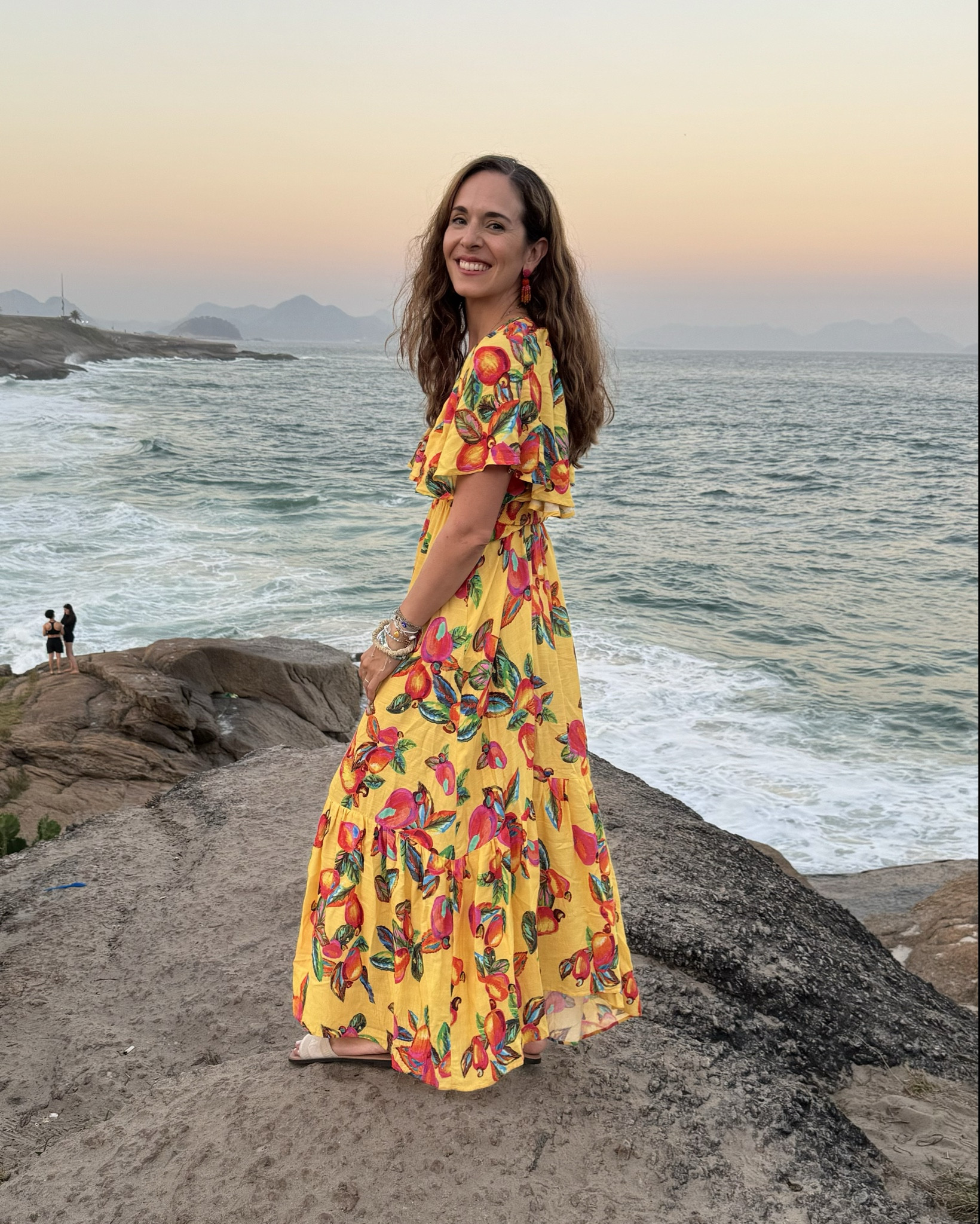Wearing my fave Brazilian brand-Farm Rio- in Rio de Janeiro! Loving this boho dress with a gorgeous front and back and flowy sleeves. The caju fruit print is so Brazilian! It’s a FarmRio Brazil piece so I linked a ton of the worldwide farm Rio dresses available right now (and there’s a huge sale going on)! 