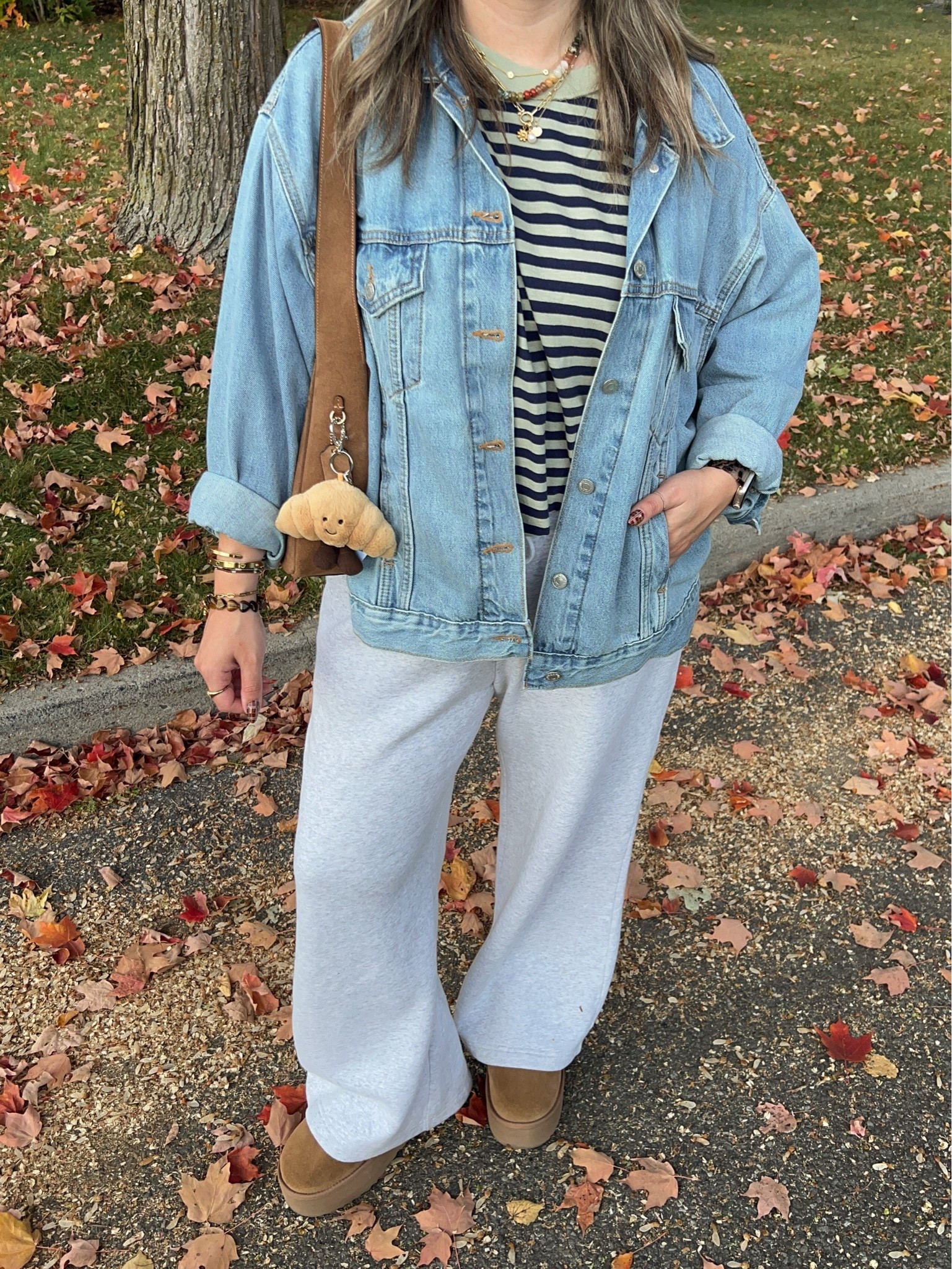 Comfy fall outfit! Wearing size L in the sweatpants and striped tee. Sized up to XL in the denim jacket for an oversized fit. I’m a 9.5-10 shoe and wear a 10 in the Uggs