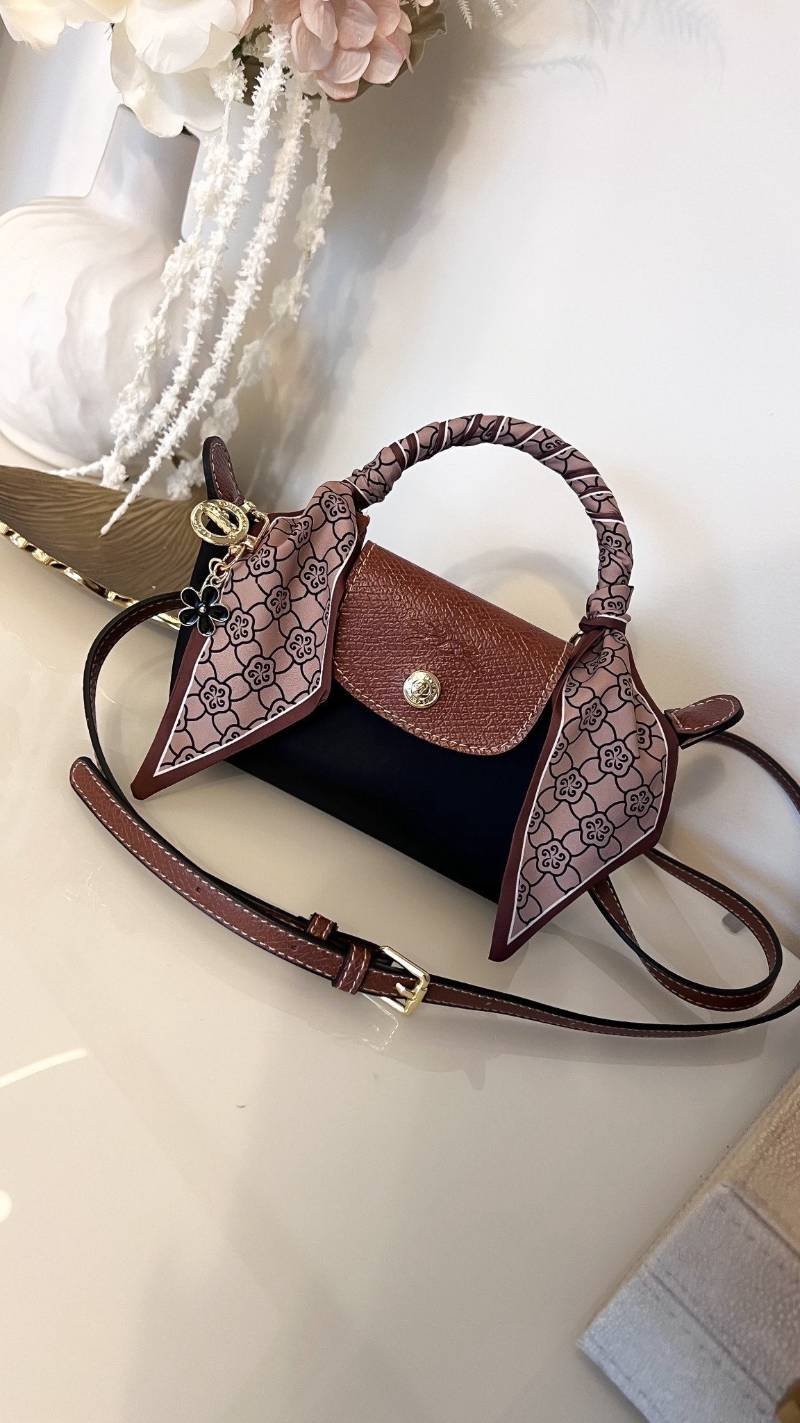 In love with my newest Amazon Designer Inspired Bag! It looks legit! And I dressed her up and made her super cute! All super affordable! It looks like my exact color way with the strap is sold out but definitely grab yours while you can in other colors too or this exact one without the strap but to me the strap is a must! It also says Longchamp on it! So totally worth it for under $20! 