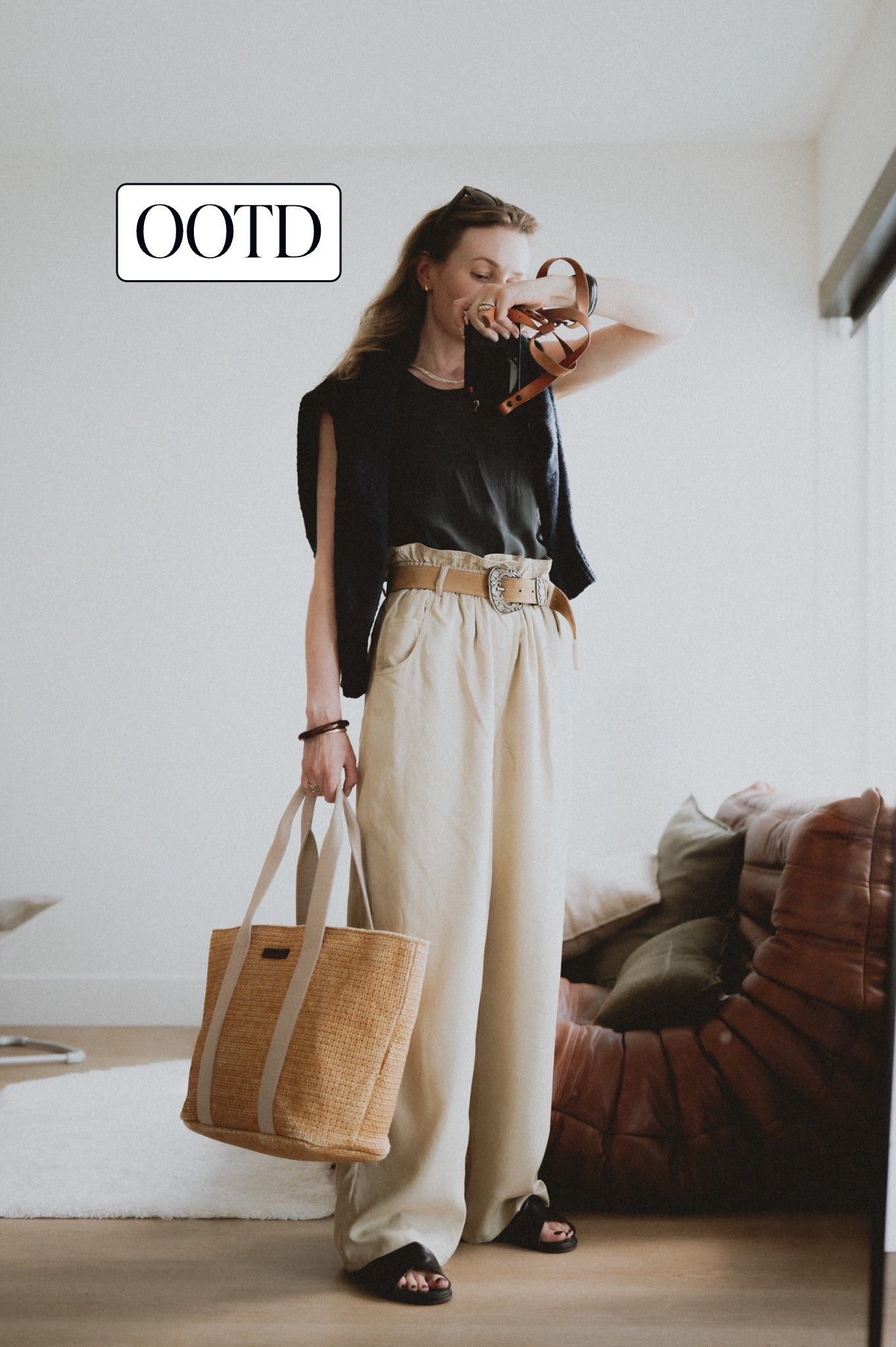 OOTD: high rise paper bag trousers, boho belt, black tank top, cotton sweater, cross cross sandals & a straw bag. 

#LTKSeasonal #LTKStyleTip #LTKWorkwear