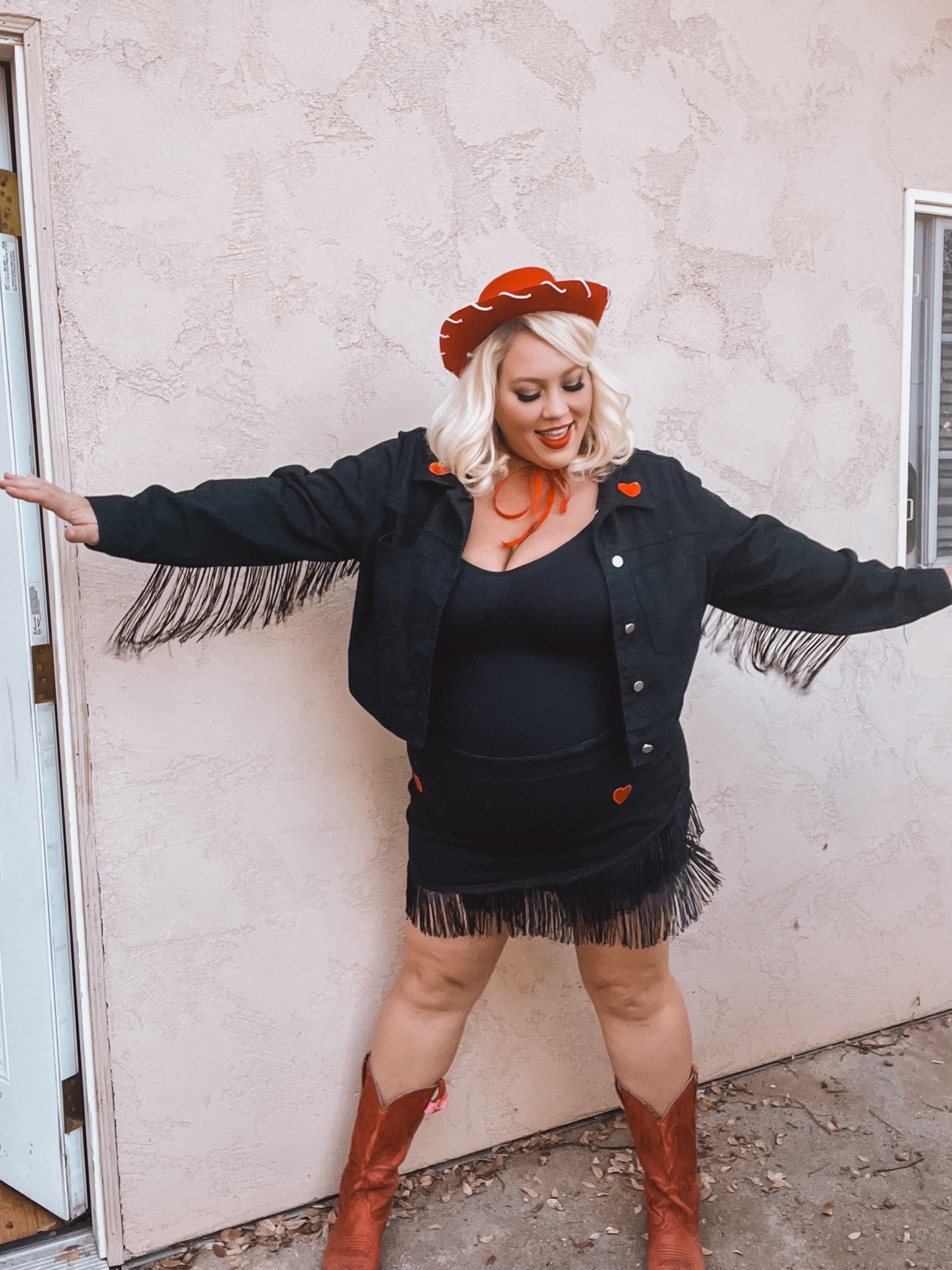 Yee haw!

cowgirl jacket and skirt with fringe
red Jessie cowgirl hat
red cowgirl boots

#LTKHalloween #LTKMidsize #LTKPlusSize