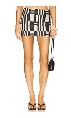 MILLY Jessie Barcelona Shimmer Puzzle Swim Skirt in Ecru & Black from Revolve.com | Revolve Clothing (Global)